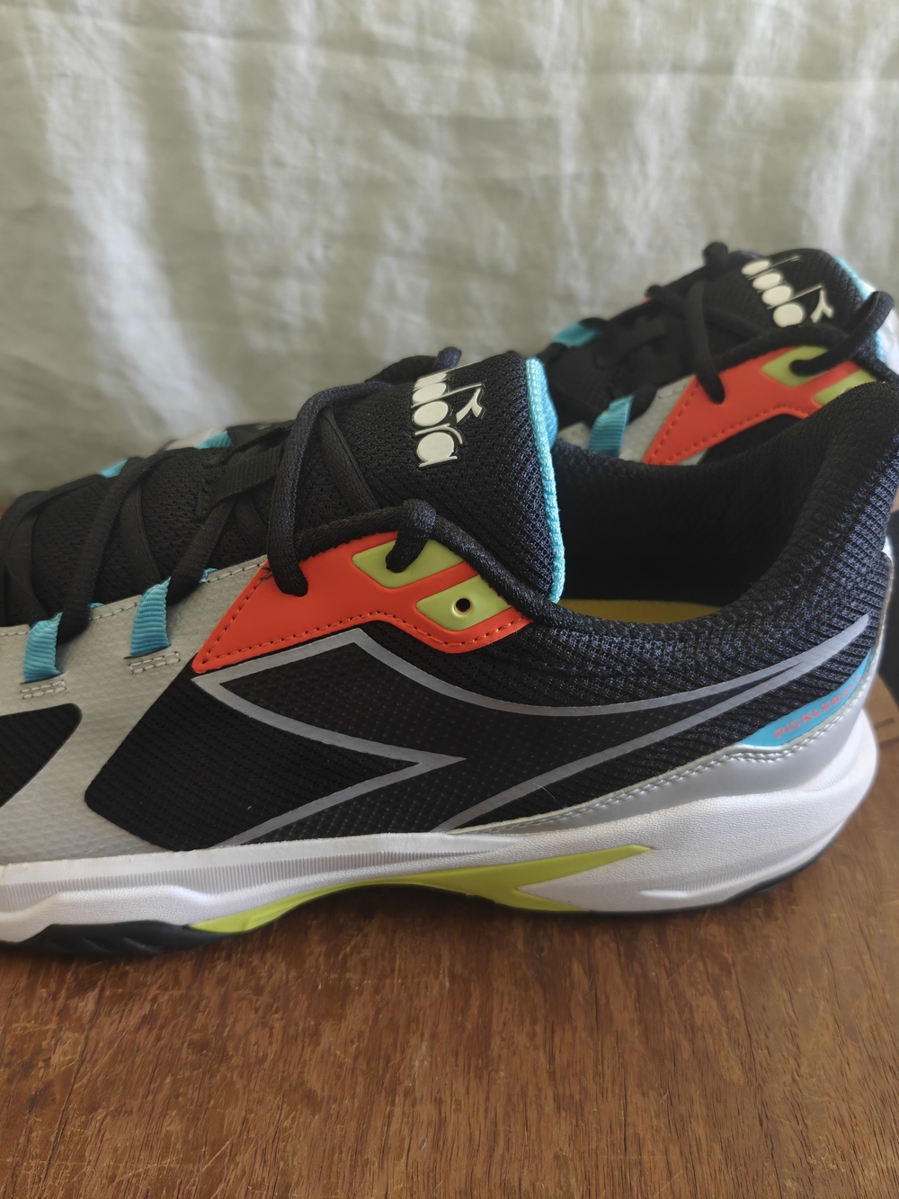 Size 12.5 Diadora B02000 Black Sneakers with Teal and Neon Red Accents